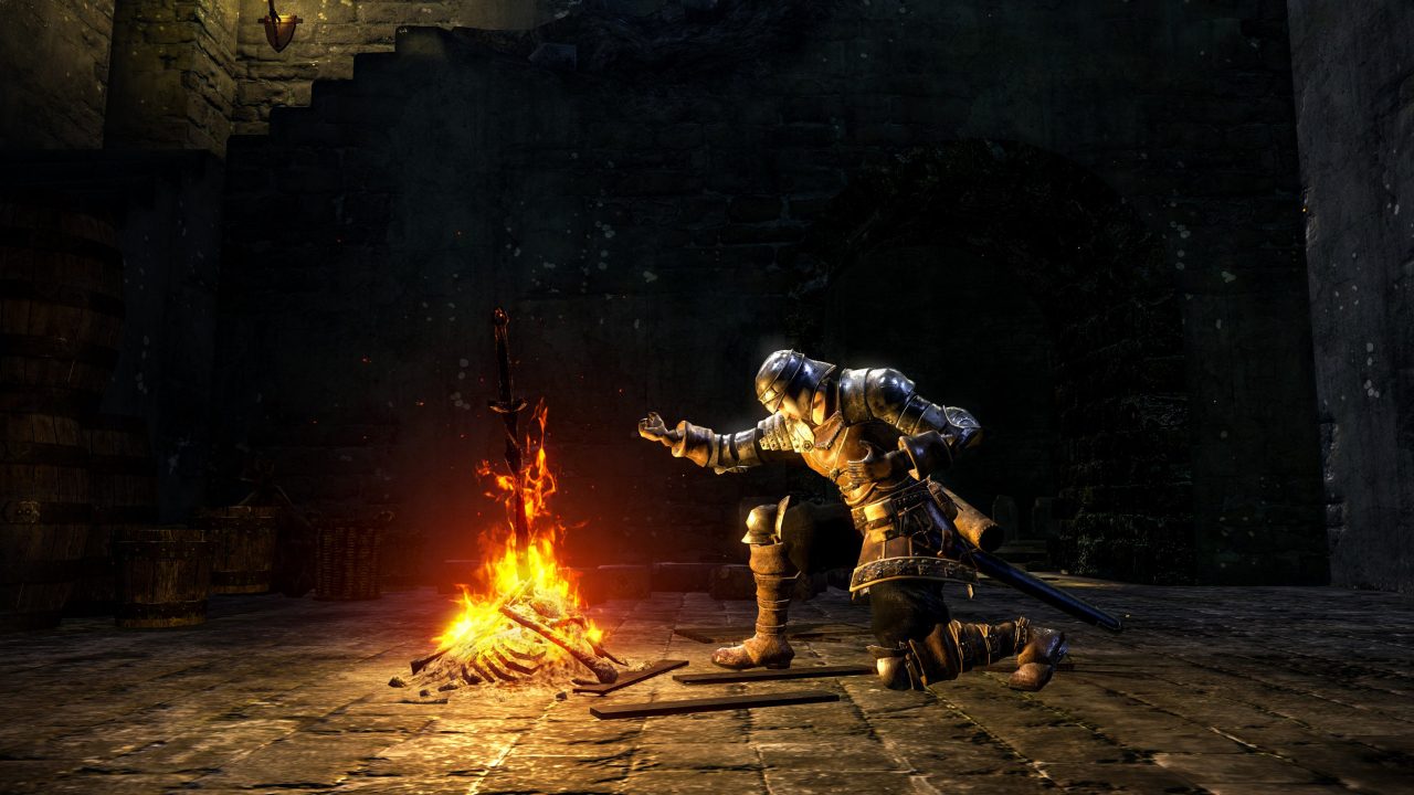 Dark Souls screenshot of a person sitting in front of a fire