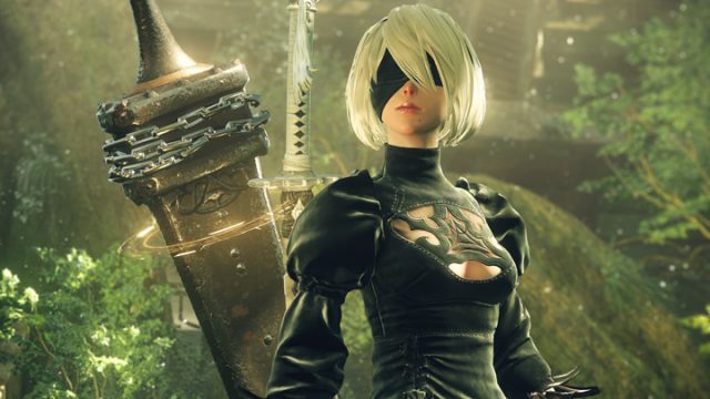 NieR: Automata's 2B, a female-appearing android with short white hair, eye mask and black dress with a large greatsword and katana strapped to her back.